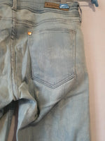 Jean skinny impression blanche avec fermeture éclair au jambes