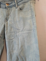 Jean skinny impression blanche avec fermeture éclair au jambes