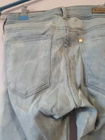 Jean skinny impression blanche avec fermeture éclair au jambes