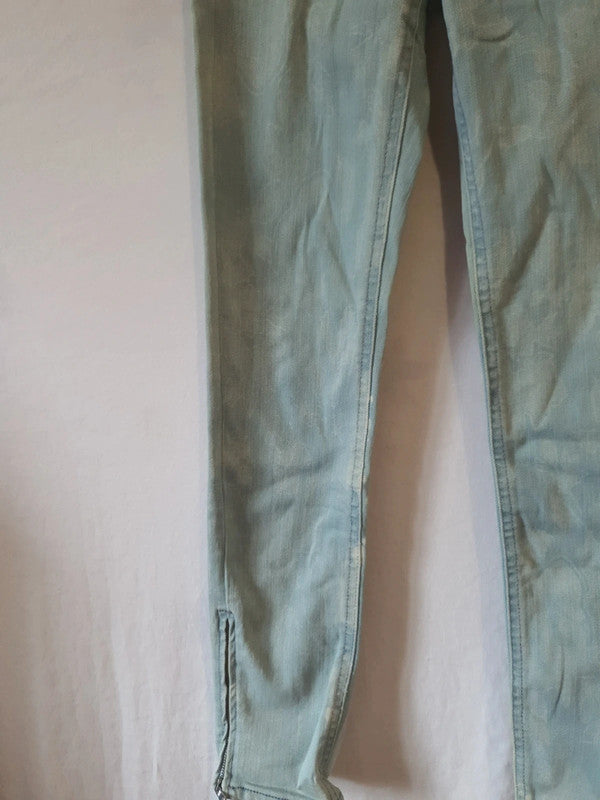 Jean skinny impression blanche avec fermeture éclair au jambes