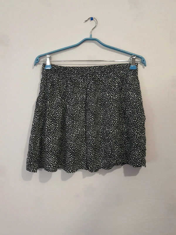 Mini jupe noir à point blanc