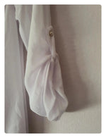 Blouse blanche avec manches réglable