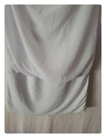 Blouse blanche avec manches réglable