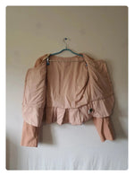 Gilet rose avec bordure doré