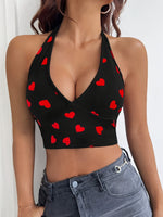 Débardeur court noir à col halter avec motif cœur rouge 