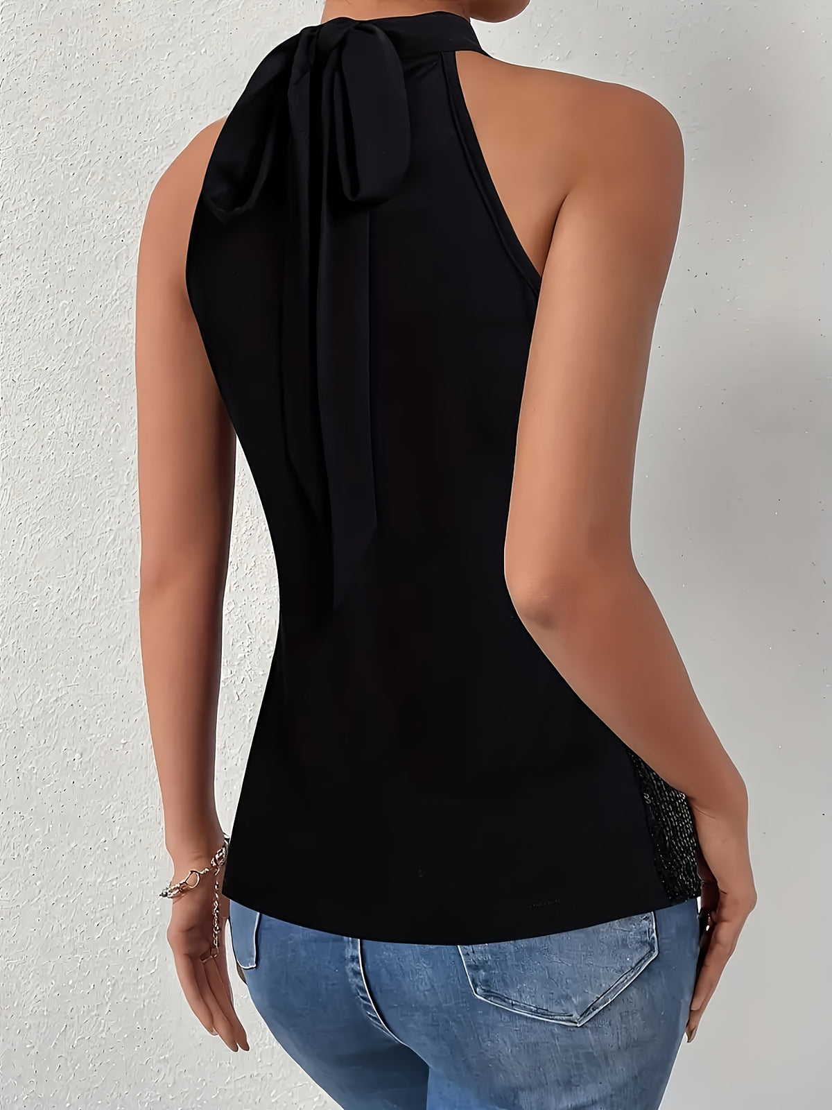 Top noir dos nu à sequins
