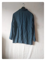Chemise manche longue.
