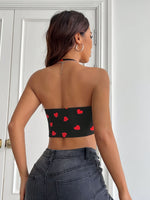 Débardeur court noir à col halter avec motif cœur rouge 