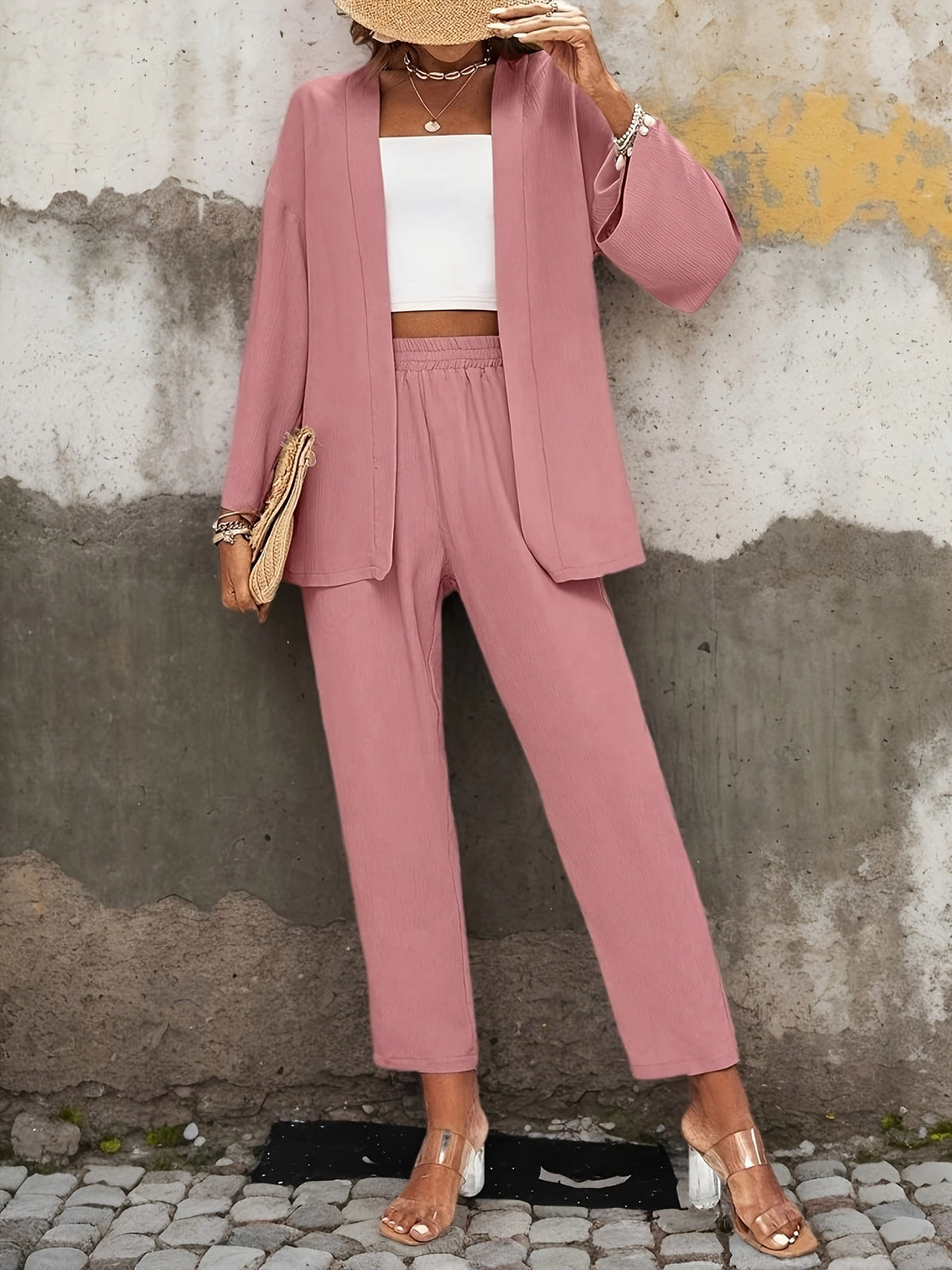 Elegant ensemble with long-sleeve cardigan and matching trousers for spring and summer.