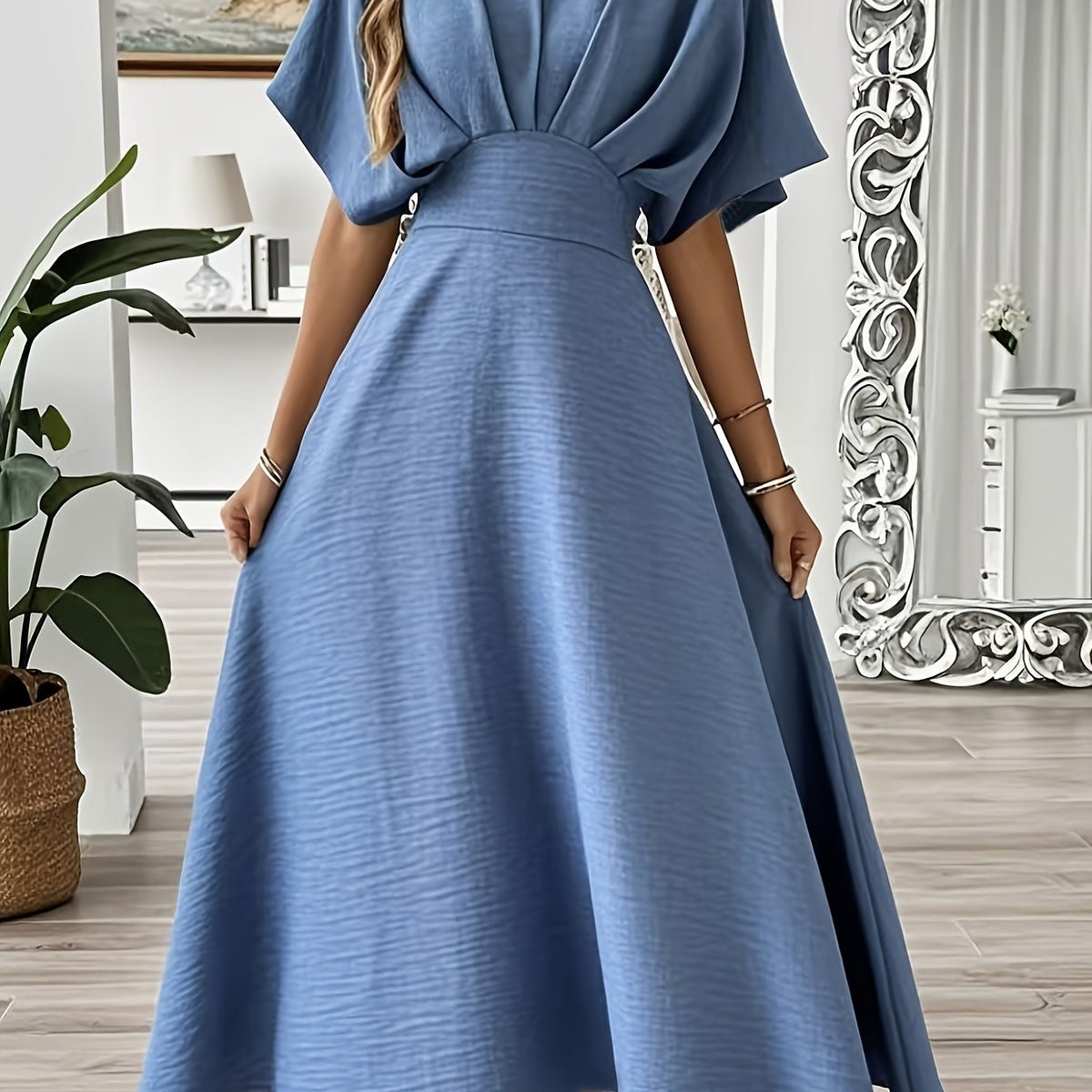 Robe longue élégante à manches chauve-souris