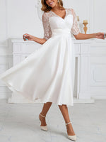 Robe midi élégante à col v en dentelle