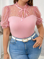 T-shirt élégant femme noir à pois blancs
