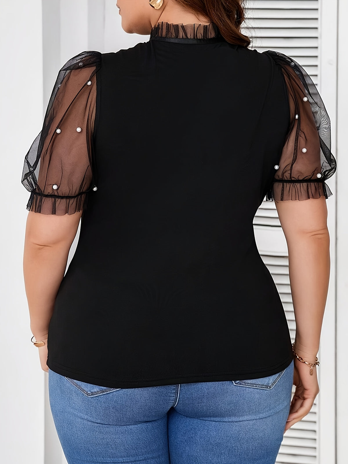 T-shirt élégant femme noir à pois blancs