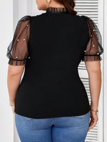 T-shirt élégant femme noir à pois blancs