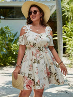 Robe grande taille à fleurs avec volants