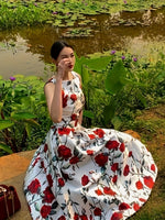 Robe longue sans manches imprimée roses rouges