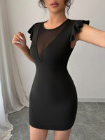 Robe moulante élégante avec manches bouffantes#Paris
