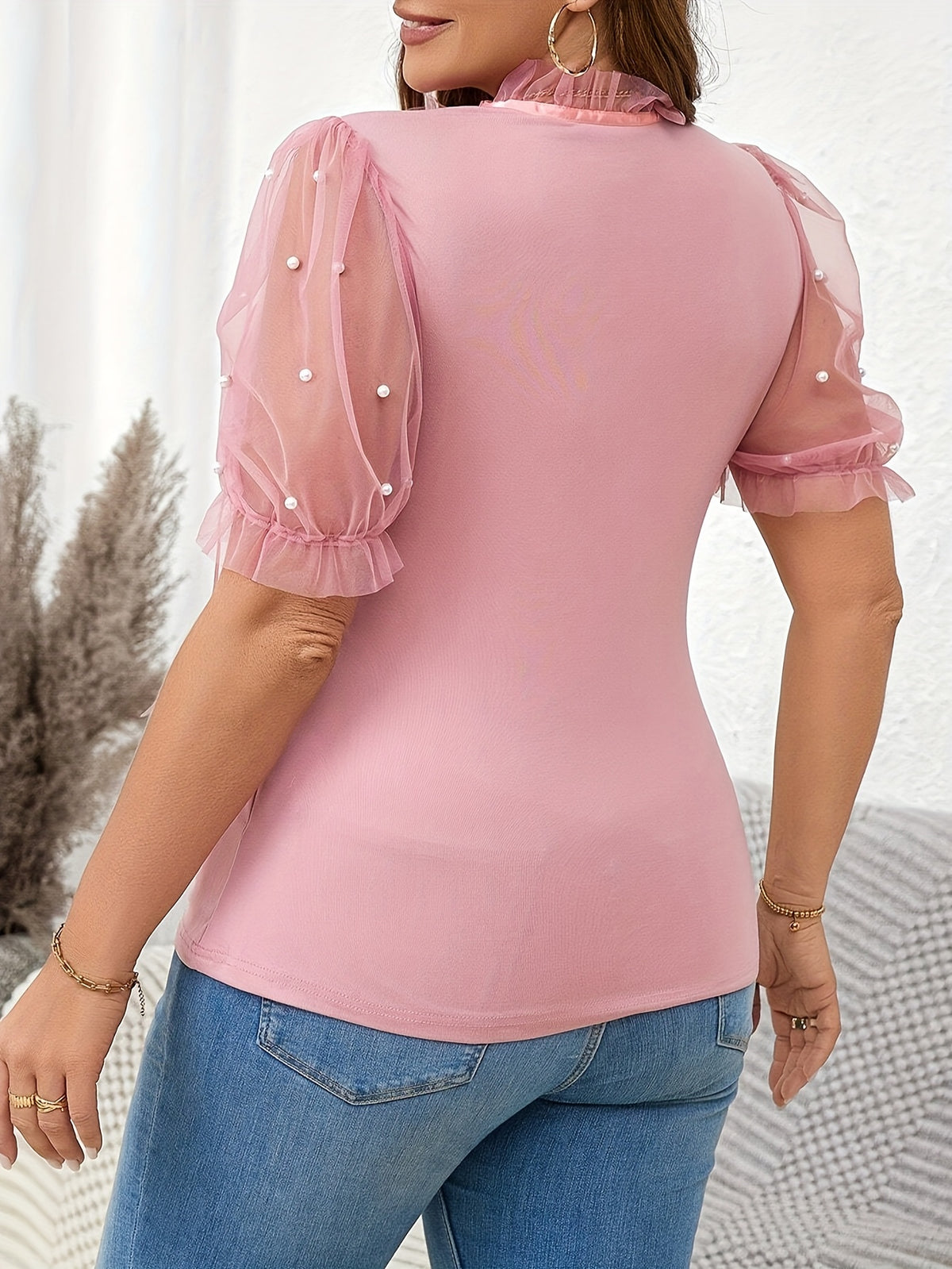 T-shirt élégant femme noir à pois blancs