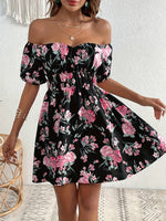 Elegant black floral off-shoulder dress, chic and flattering Summer style.