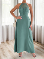 Robe longue élégante en dentelle à col halter