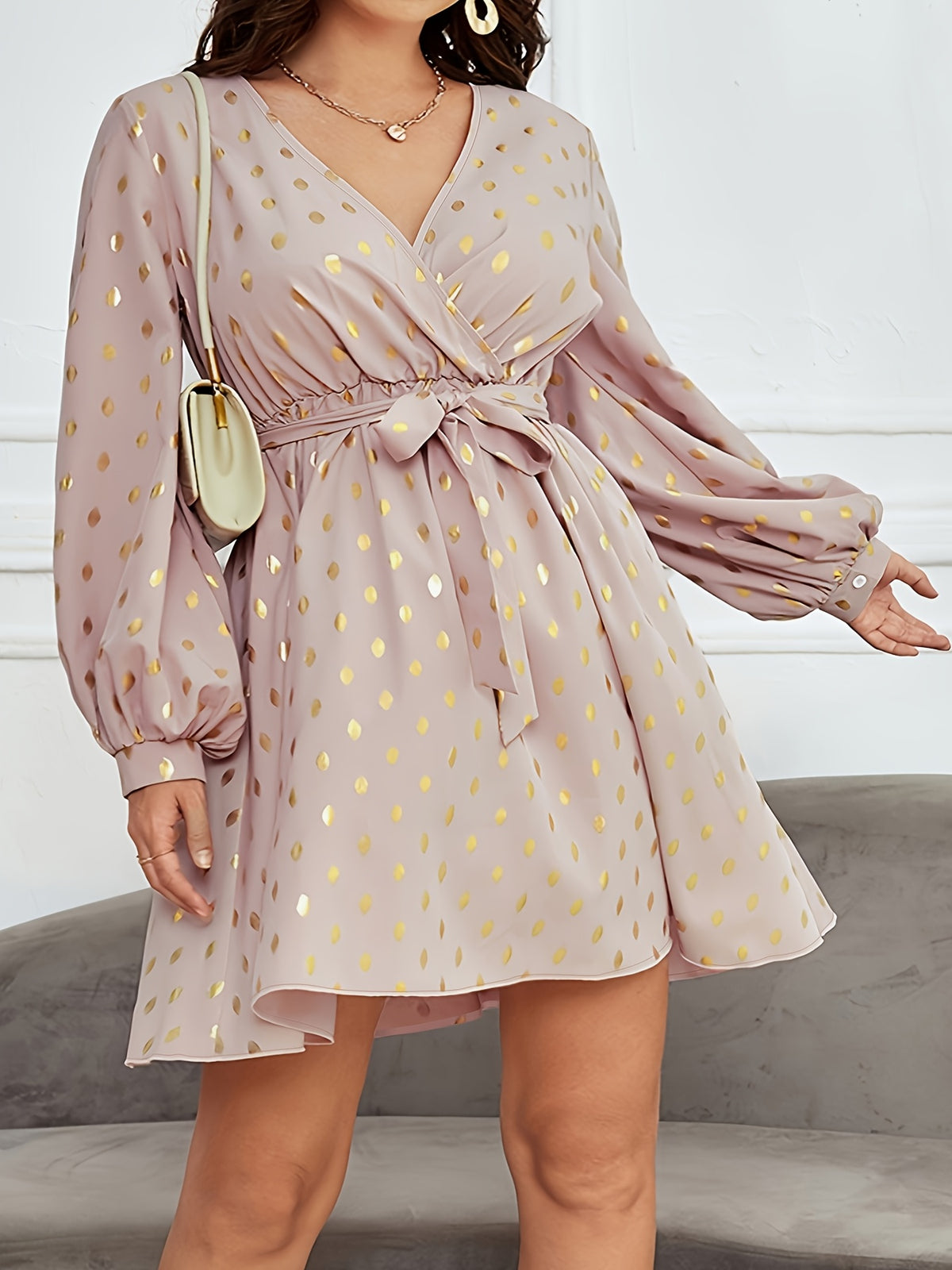 Robe élégante à pois cuivrés