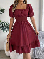Elegant square neckline dress with ruffled short sleeves, chic and feminine style.