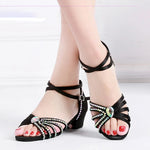 Black open sandals with pearls, stylish and comfortable for summer outings.