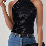 Top noir dos nu à sequins