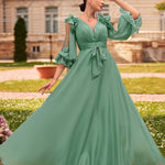 Robe longue élégante à manches bouffantes en dentelle