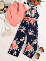 Trendy and casual girls' outfit: floral print halter romper with belt and pink jacket.