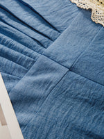 Robe longue élégante à manches chauve-souris