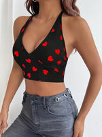 Débardeur court noir à col halter avec motif cœur rouge 