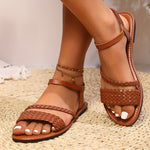 Comfortable summer sandals for women with minimalistic design, brown braided straps, and cushioned sole.