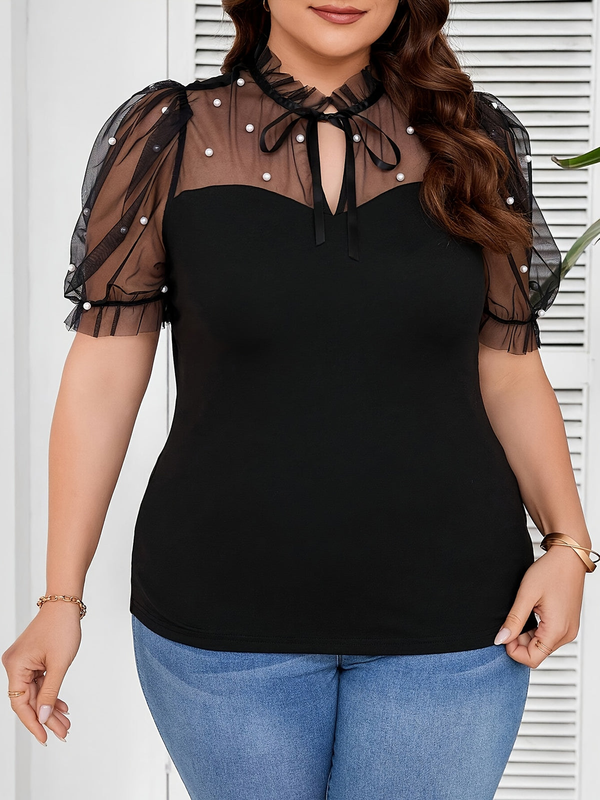 T-shirt élégant femme noir à pois blancs
